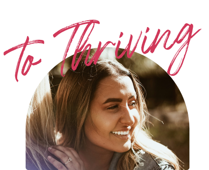 Smiling woman in warm light.