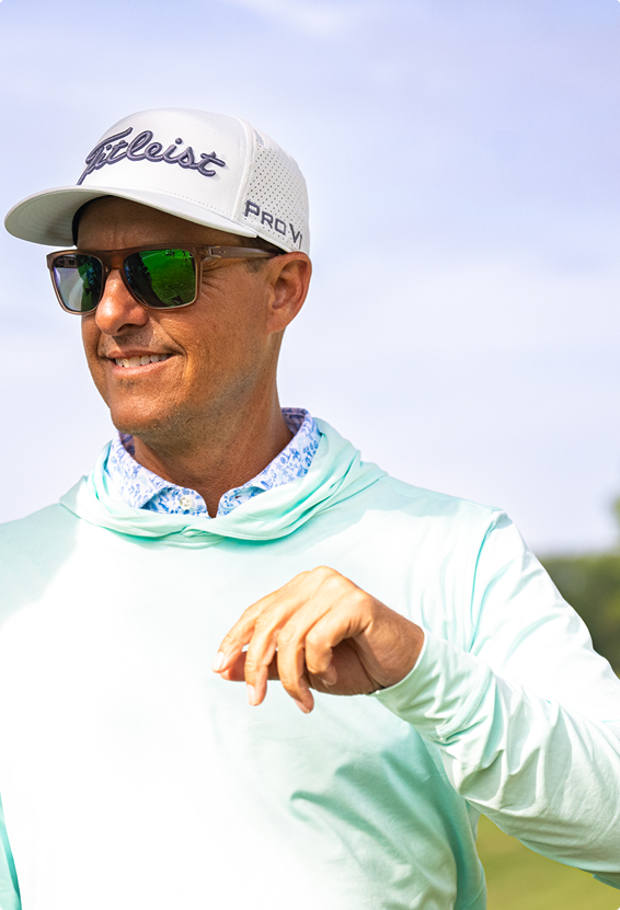 Parker McLachlin speaking on a practice green